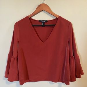 Rust colour blouse